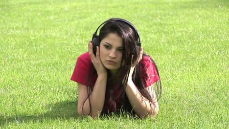 Stock-Video-Woman-Listening-to-Music