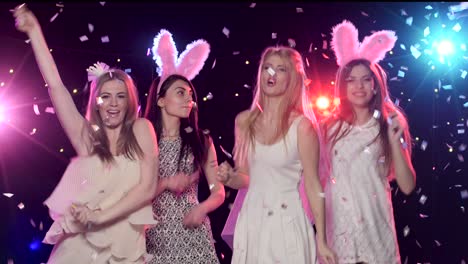 four women celebrating at a party