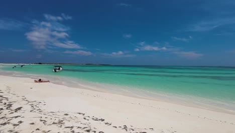 escape to paradise crystal blue waters with white sand beach, pan right los roques