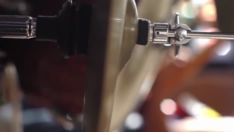 drum set plate played by drummer at concert, close up view vertical