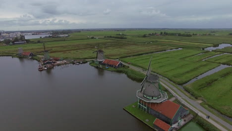 windmills and fields in dutch village aerial view