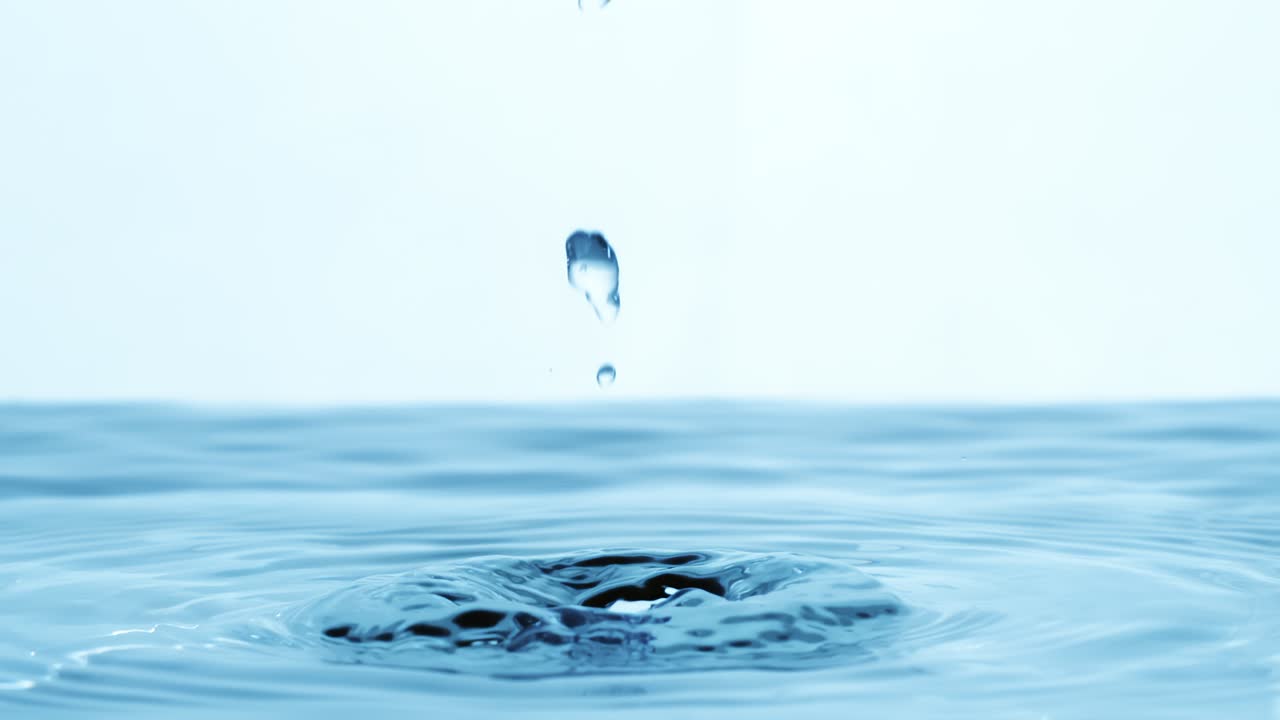 Water Drops close-up of water falls in a super slow motion. Shot on super slow motion camera 1600 fps