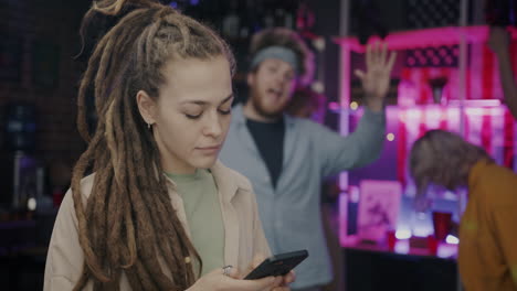 young woman with dreadlocks at a party