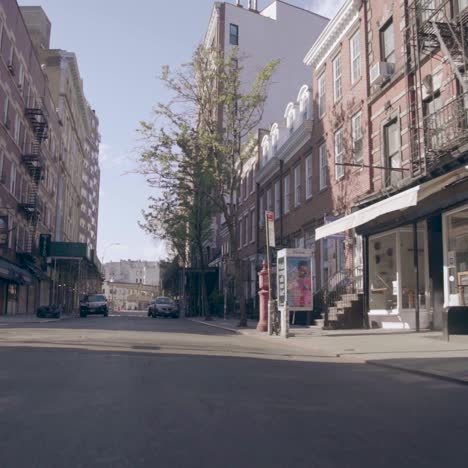 pov shot of empty streets of new york manhattan during the covid19 coronavirus epidemic outbreak people with masks 1