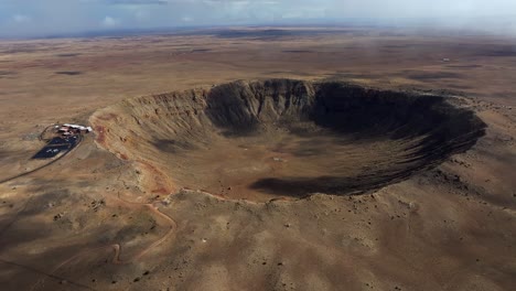 4k aerial of meteor crater or barringer crater in arizona, usa