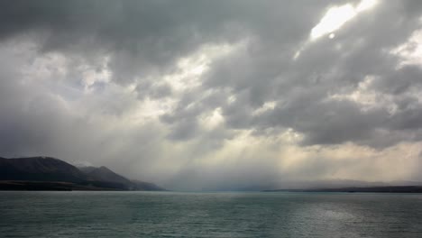 Rainstorm-clouds-over-Lake-Pukaki,-New-Zealand