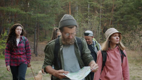 Hikers with a Map in the Forest