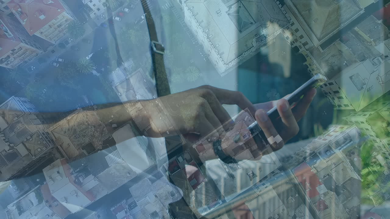 Animation of man using smartphone over cityscape