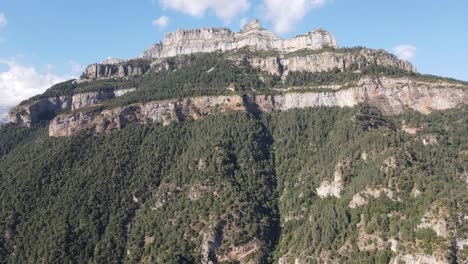 Aerial-views-of-a-mountain-range-with-a-Valley-in-the-Spanish-Pyrenees,-near-Huesca