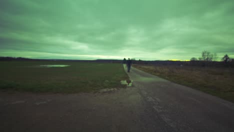 Modern-Black-Swordsman-Warrior-Awaiting-Battle-Opponent-in-Open-Field-Under-Green-Sky,-Europe,-4K-|-Muscular,-Intimidating,-Shadow,-Figure,-Blurry,-Dark-Clothes,-Powerful,-Blurry,-Walk-Towards,-Sneaky