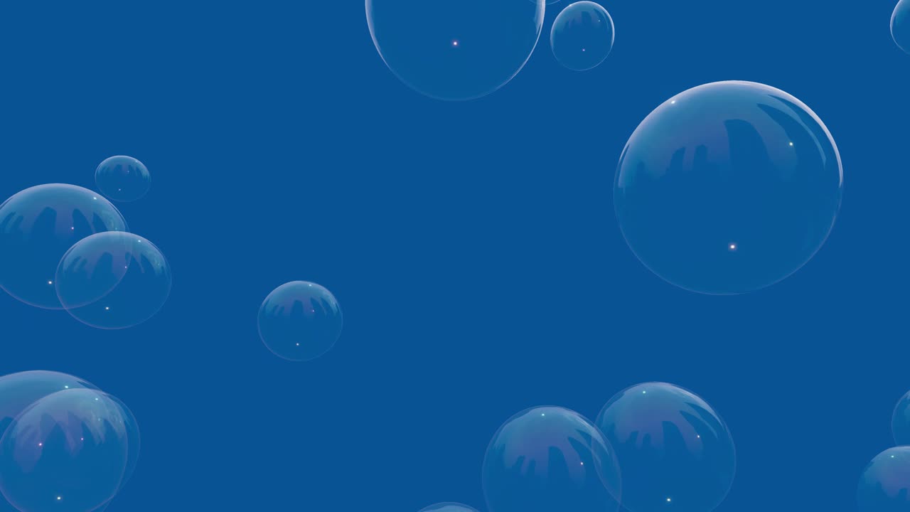 Transparent soap bubbles drift slowly upwards against a solid blue background with soft lighting