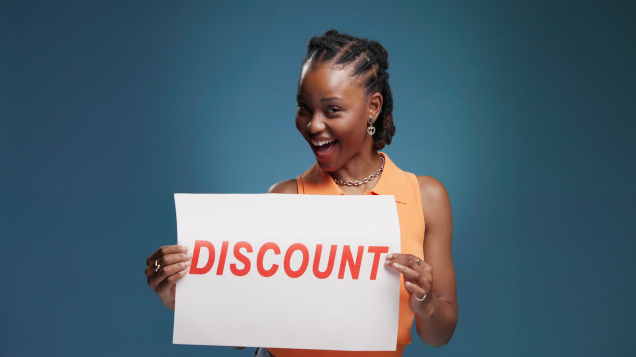Excited Woman Holding Discount Sign