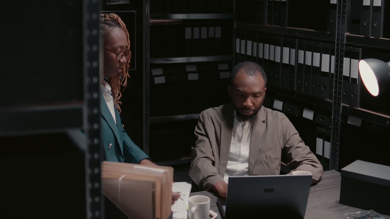 Detectives working in the office