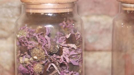 dried flowers in glass jars