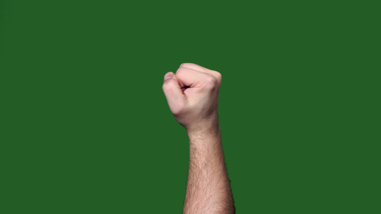 Schermo verde. Chromakey. Pugno maschile che bussa alla porta