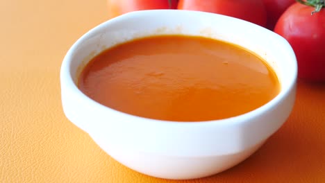 tomato soup in a white bowl