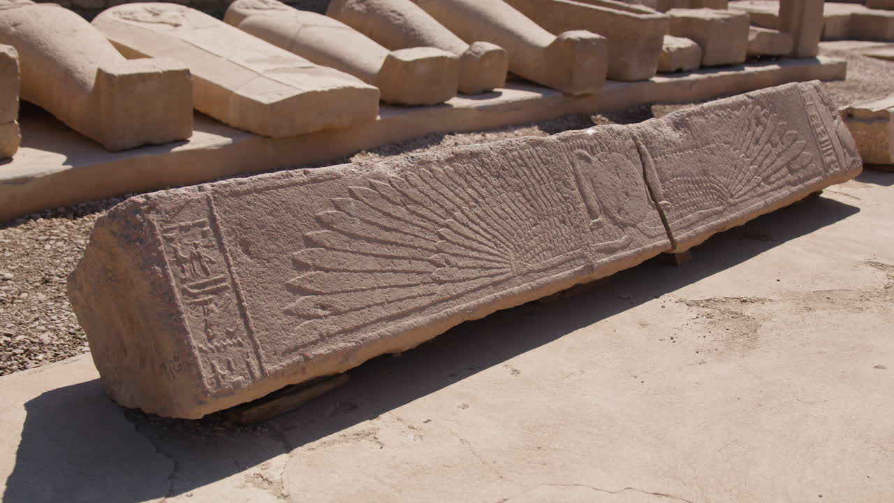 Ancient stone relief with hieroglyphics and carvings at Dendera Temple