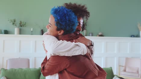young arabian man and african american woman to hug after long separation