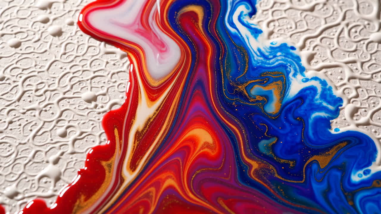 Vibrant Fluid Art with Red, Blue, and Gold Swirls