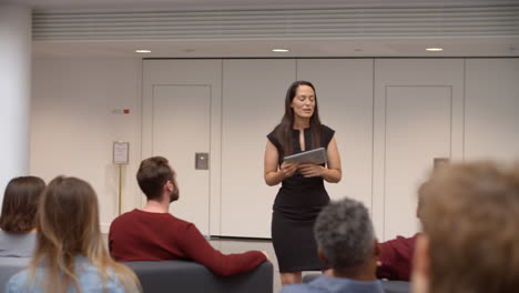 teacher presenting lesson to university students, close up