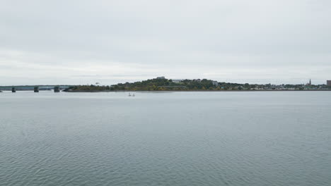 Forward moving aerial shot of Tukey's Bridge, coast of Portland Maine, USA.