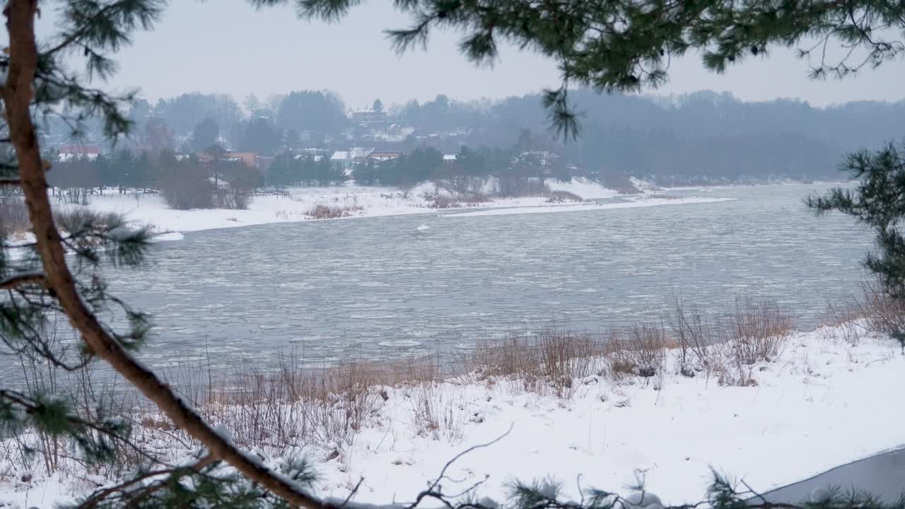Time lapse of running river with a lot of ice blocks.