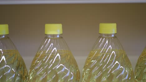 bottles of cooking oil on a shelf