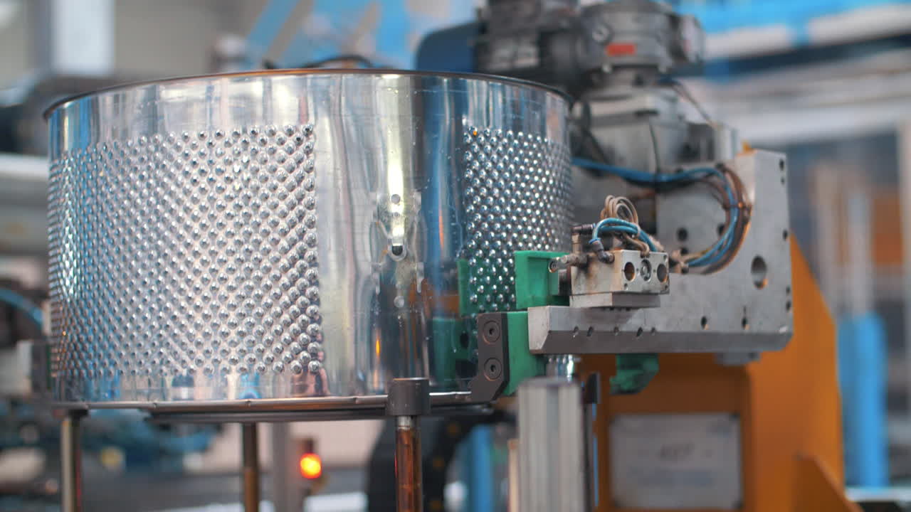 fabricación de tambores para lavadora en equipos robóticos en la fábrica