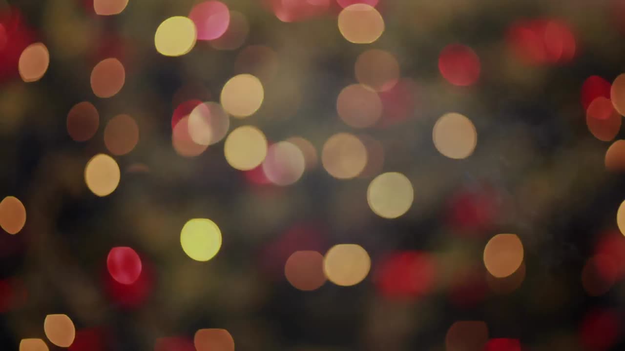 animación de una forma de gas negro y púrpura flotando sobre luces amarillas y rojas parpadeando en el fondo