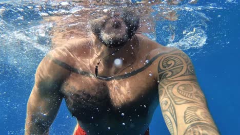 adult man swimming in the sea