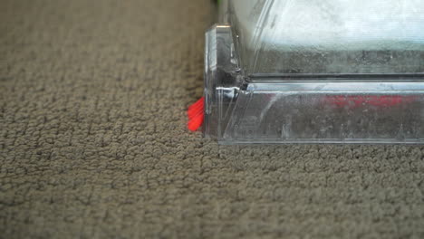 Carpet-cleaner-sucking-dirt-and-grime-up-to-make-it-appear-new