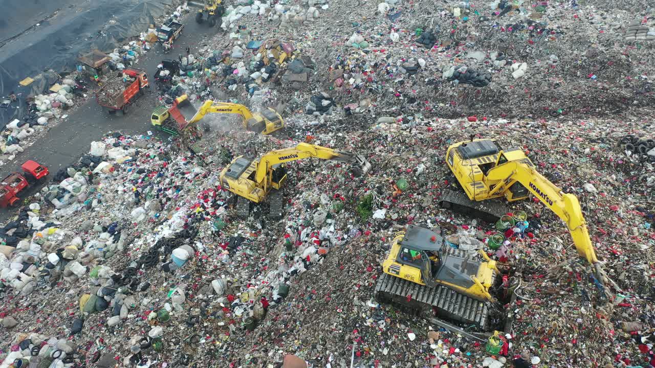 Garbage Dump with Heavy Machinery