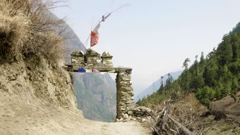 arch to nepalese village lho. manaslu circuit trek.