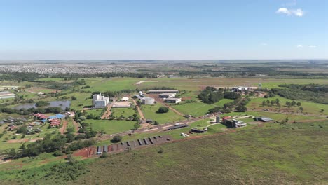 aerial panoramic view revealing parque del conocimiento, silicon misiones, posadas airport, and cepard sports center in posadas, province of misiones, argentina. drone 4k.