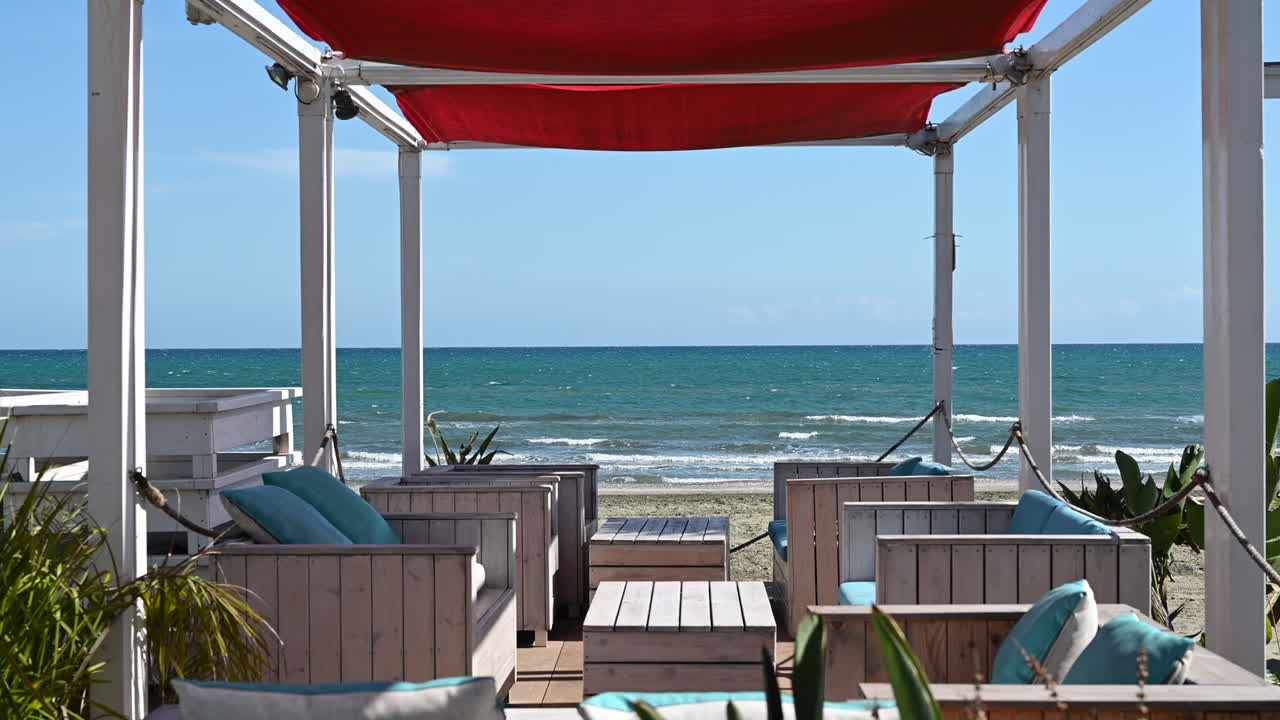 Empty cafe on a beach on a sunny day in Cyprus