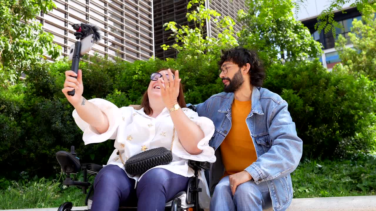 Woman in Wheelchair Vlogging with Friend