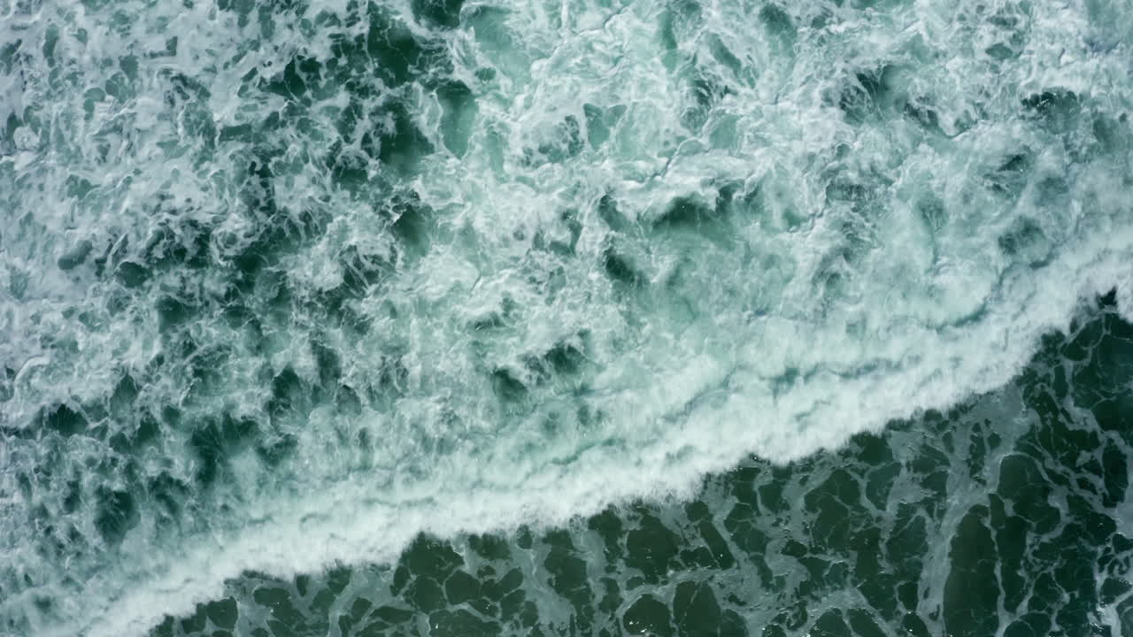 Aerial: waves crossing the shore South Africa