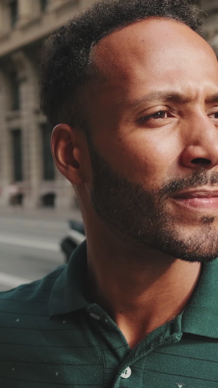 Man in Green Polo Shirt Smiling