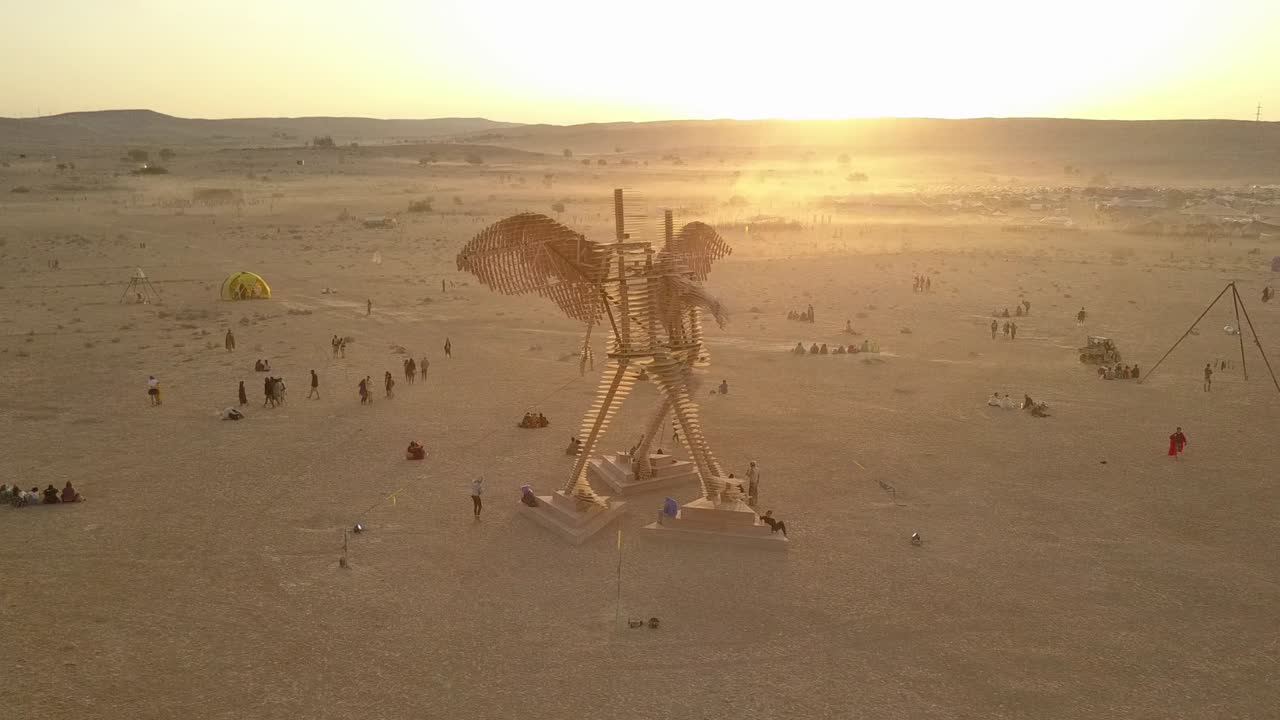 Giant Wooden Sculpture at a Desert Festival