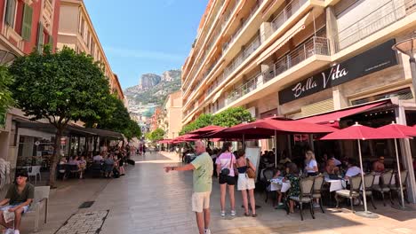 tourists walking and dining in monte carlo