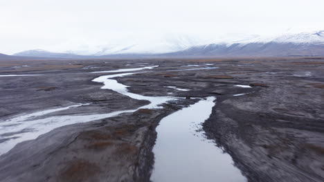 Aerial-shot-of-an-alluvial-fan-in-an-arctic-valley-6