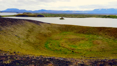 iceland pan past psuedo-craters of midge lake or myvatn, volcanic craters that have collapsed, beautiful icelandic vista in 4k prorezhq