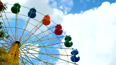 colorful ferris wheel in an amusement park.