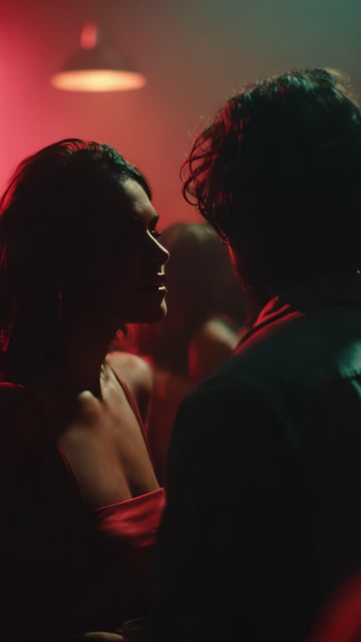 A Captivating Encounter: The Electric Tension Between Two Individuals in a Dimly Lit Atmosphere, Surrounded by Colorful Lights and Intriguing Shadows