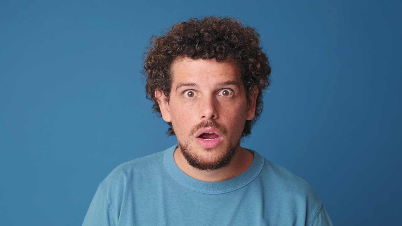 Close-up of Man Showing Shocked Facial Expression