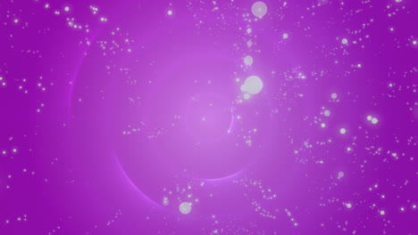 digitally generated video of glowing spots moving in hypnotic motion against violet background