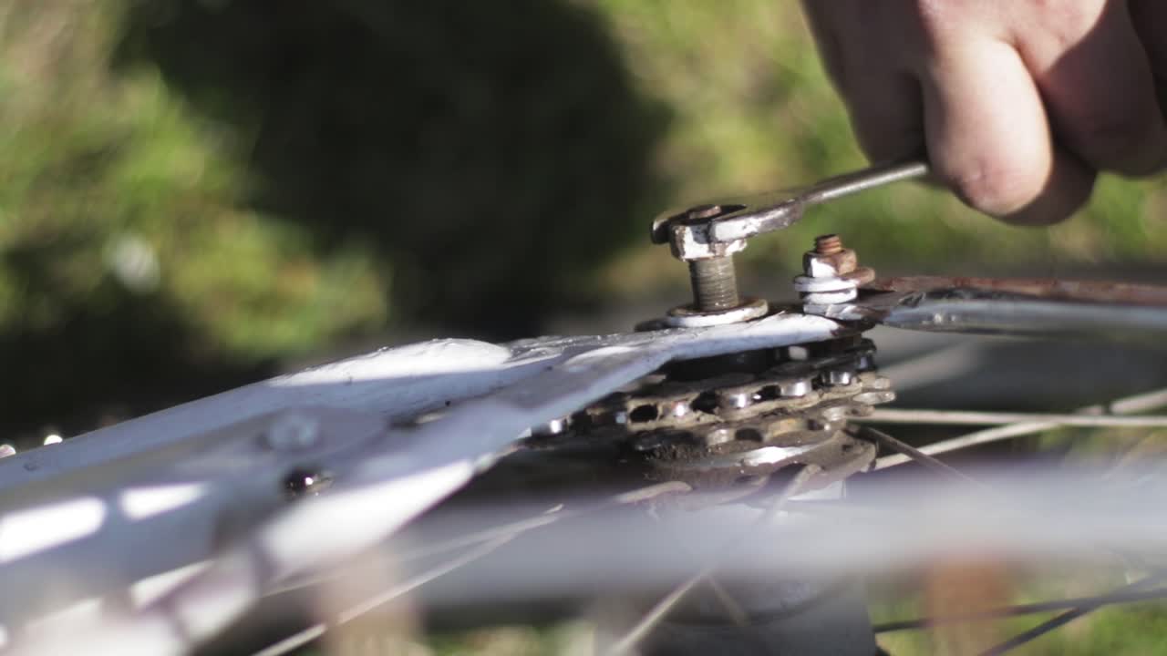 Repairing a wheel of a broken bike. Bicycle repair. Bike restoration.
