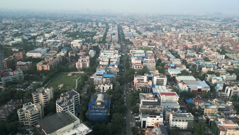 noida sector 15 city drone moving front top view in delhi.