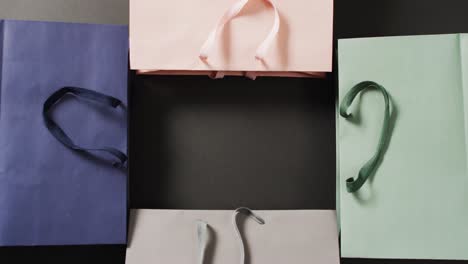 Pastel-coloured-gift-bags-with-central-black-copy-space