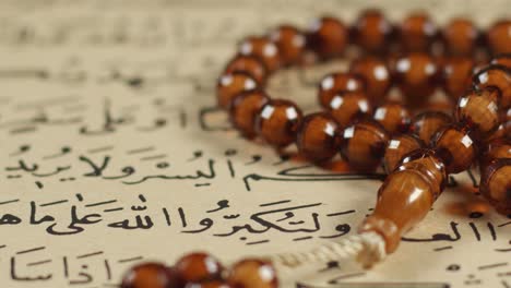 prayer beads on the quran page